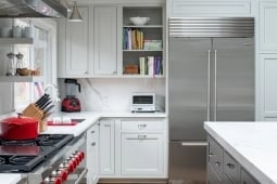 Kitchen Remodeling Services Modern Kitchen Custom Cabinetry and Marble Backsplash | Denny + Gardner Design-Build Remodelers
