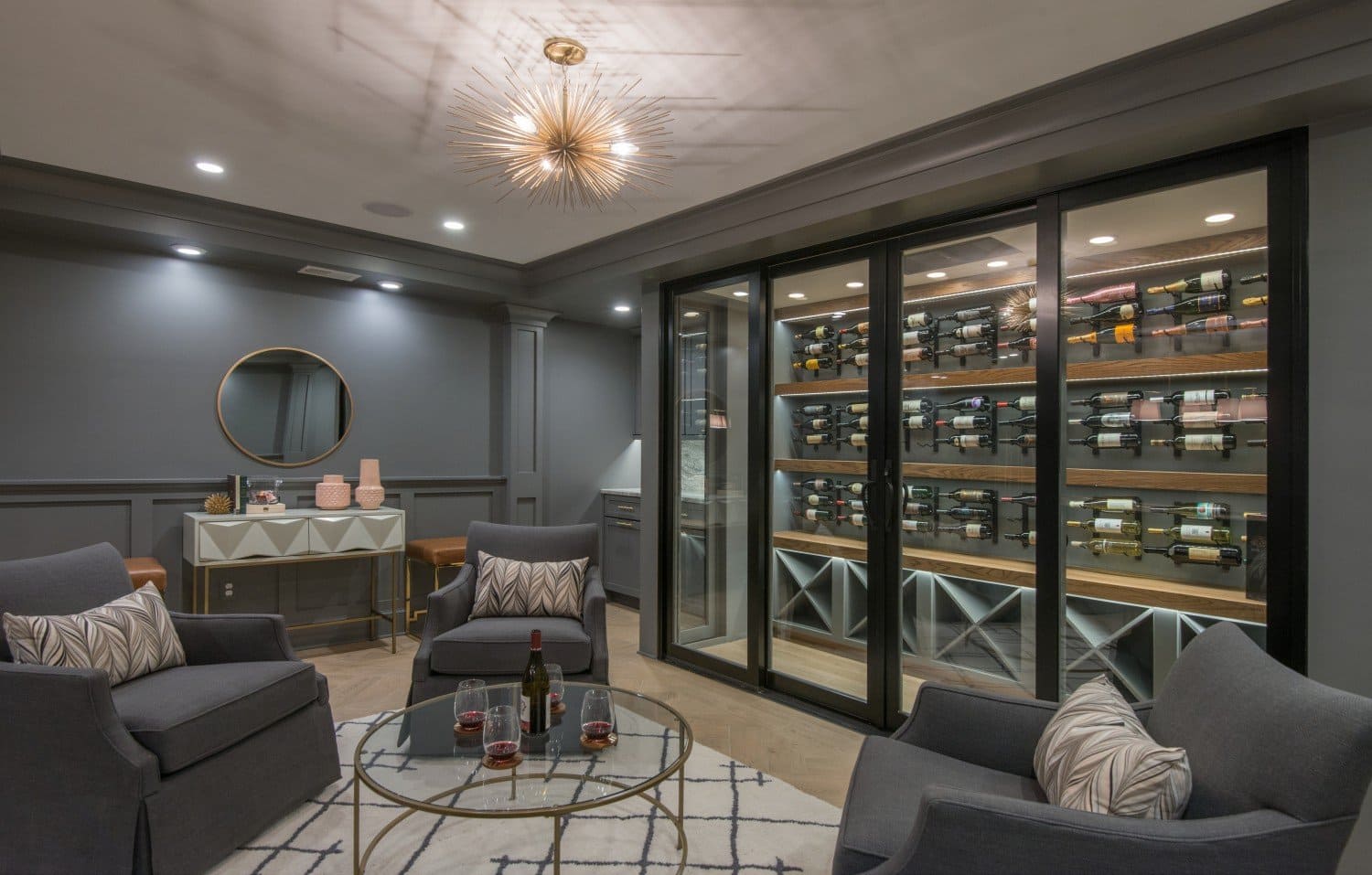 Walk In Wine Cooler Turns Basement Remodel Project into Classy Hangout Area | Denny + Gardner Basement Remodeling Services