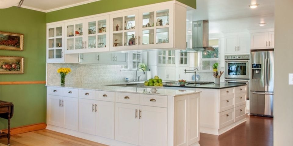 doubled sided cabinetry in traditional style kitchen design