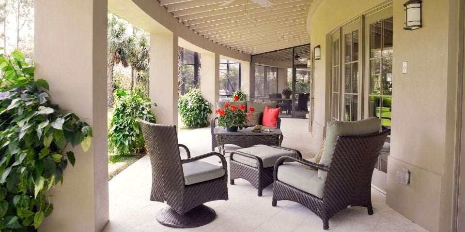 outdoor patio living space with dark brown patio furniture