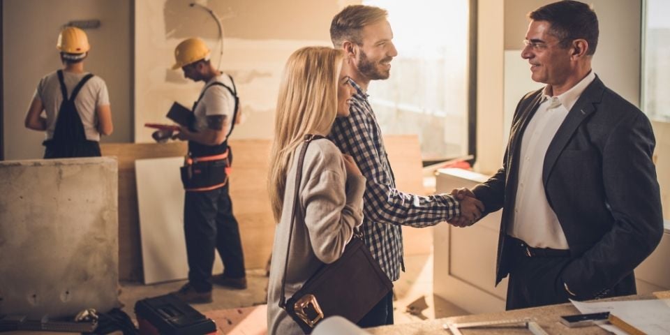 Couple meeting with contractor