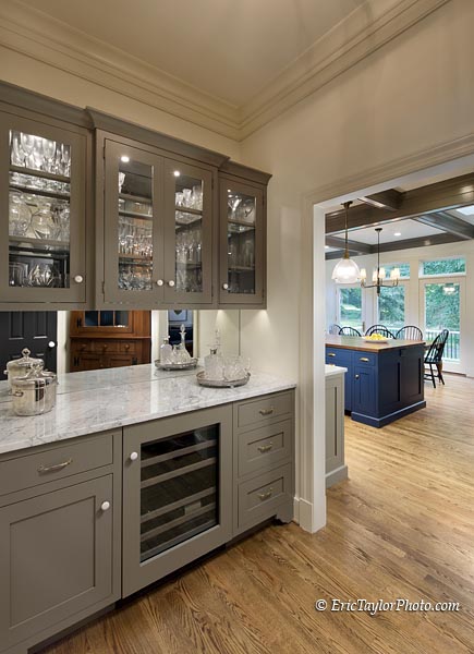 large-wet-bar-with-overhead-open-shelves