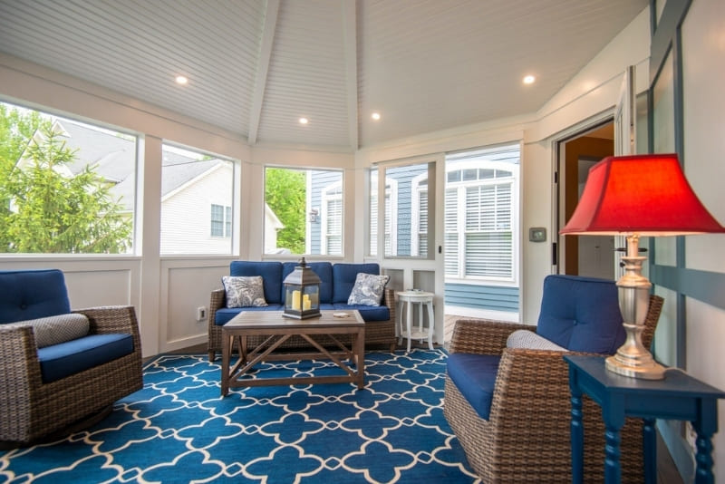 Large Enclosed Porch with High Ceilings with Beautiful Wood Features and Recessed Lighting | Denny + Gardner Outdoor Living Space Services