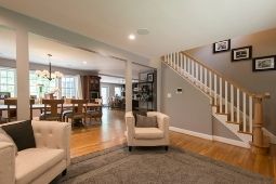 Interior Whole Home Remodel Stair Railing and Open-Concept Floor Plan - Whole Home Remodeling Services | Denny + Gardner