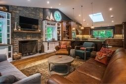 Kitchen Bump-Out Addition with Skylights and Recessed Lighting and Accent TV Wall with Fireplace - Home Addition Services | Denny + Gardner