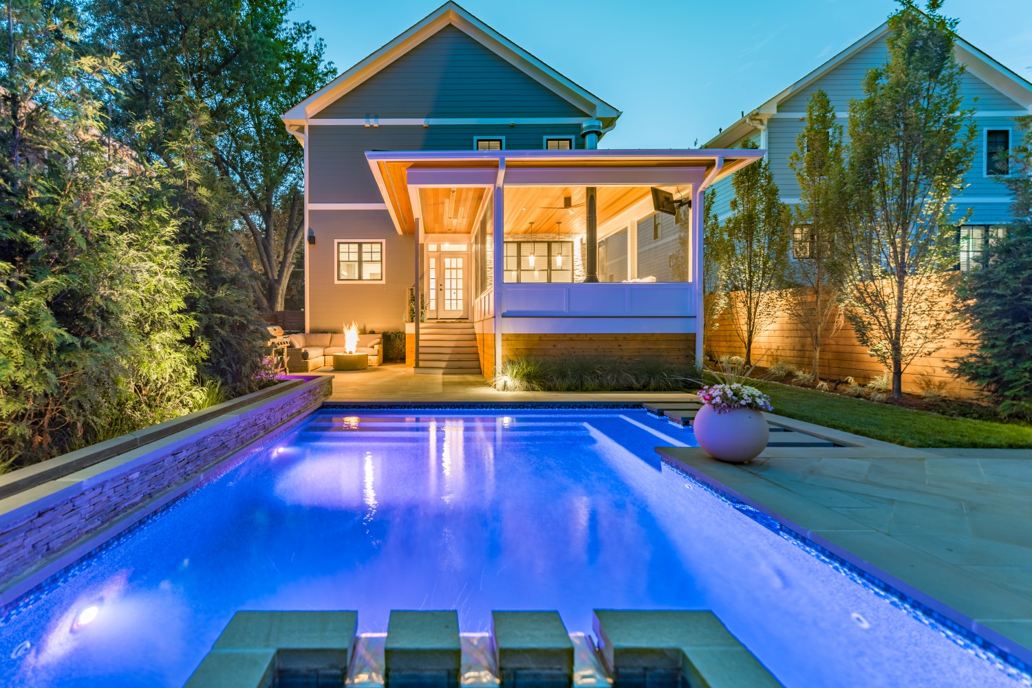 award-winning-patio-at-night-with-pool